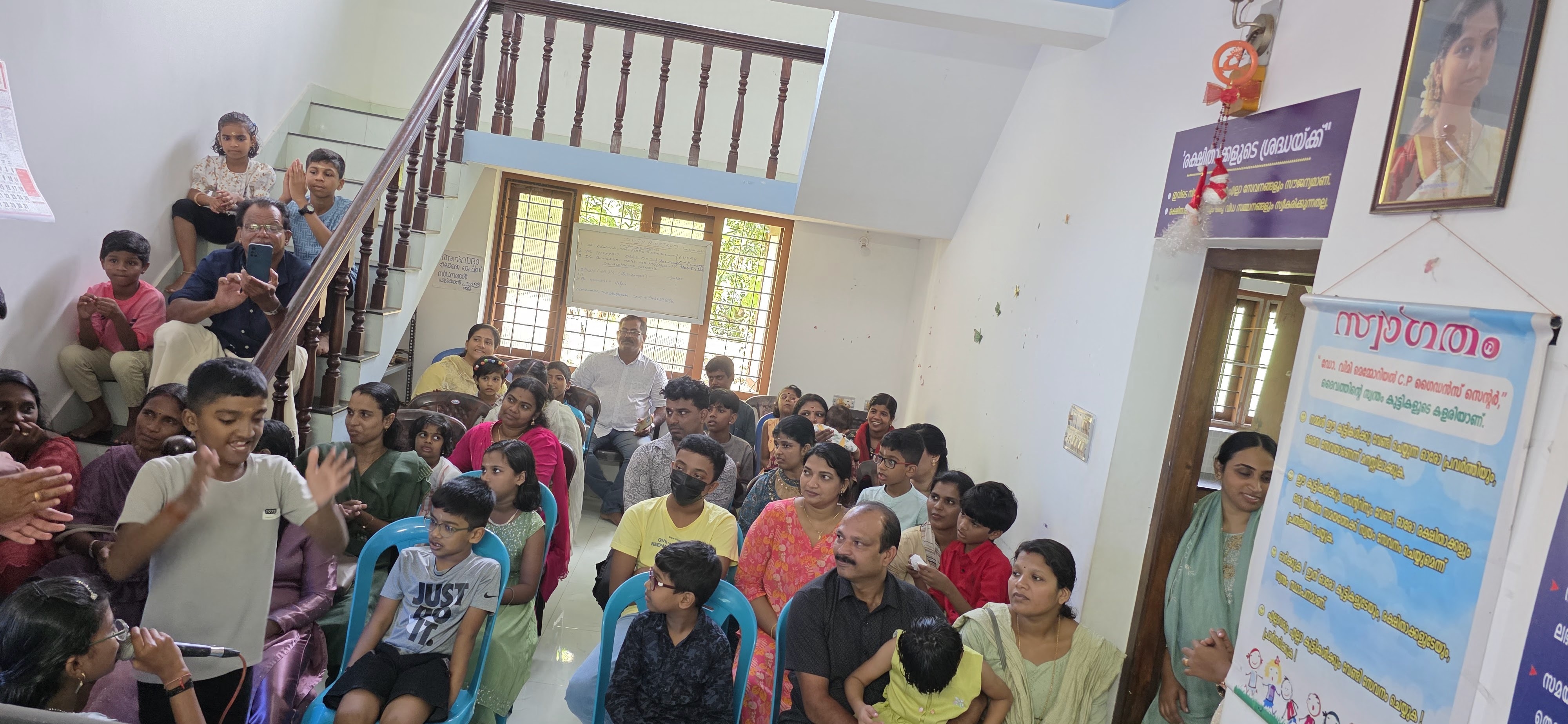 Families and children gathered at a Society community event