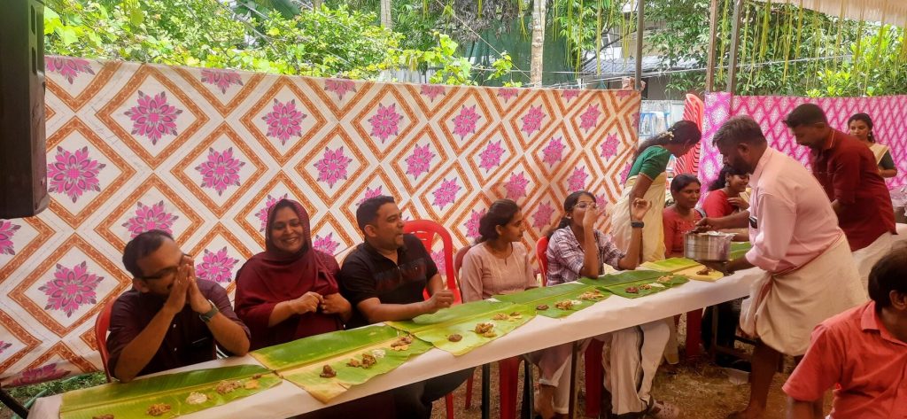 Onasadya served on banana leaves to families at the centre
